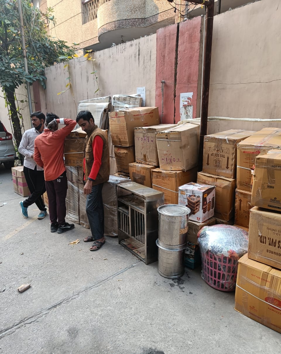 Movers loading household goods safely